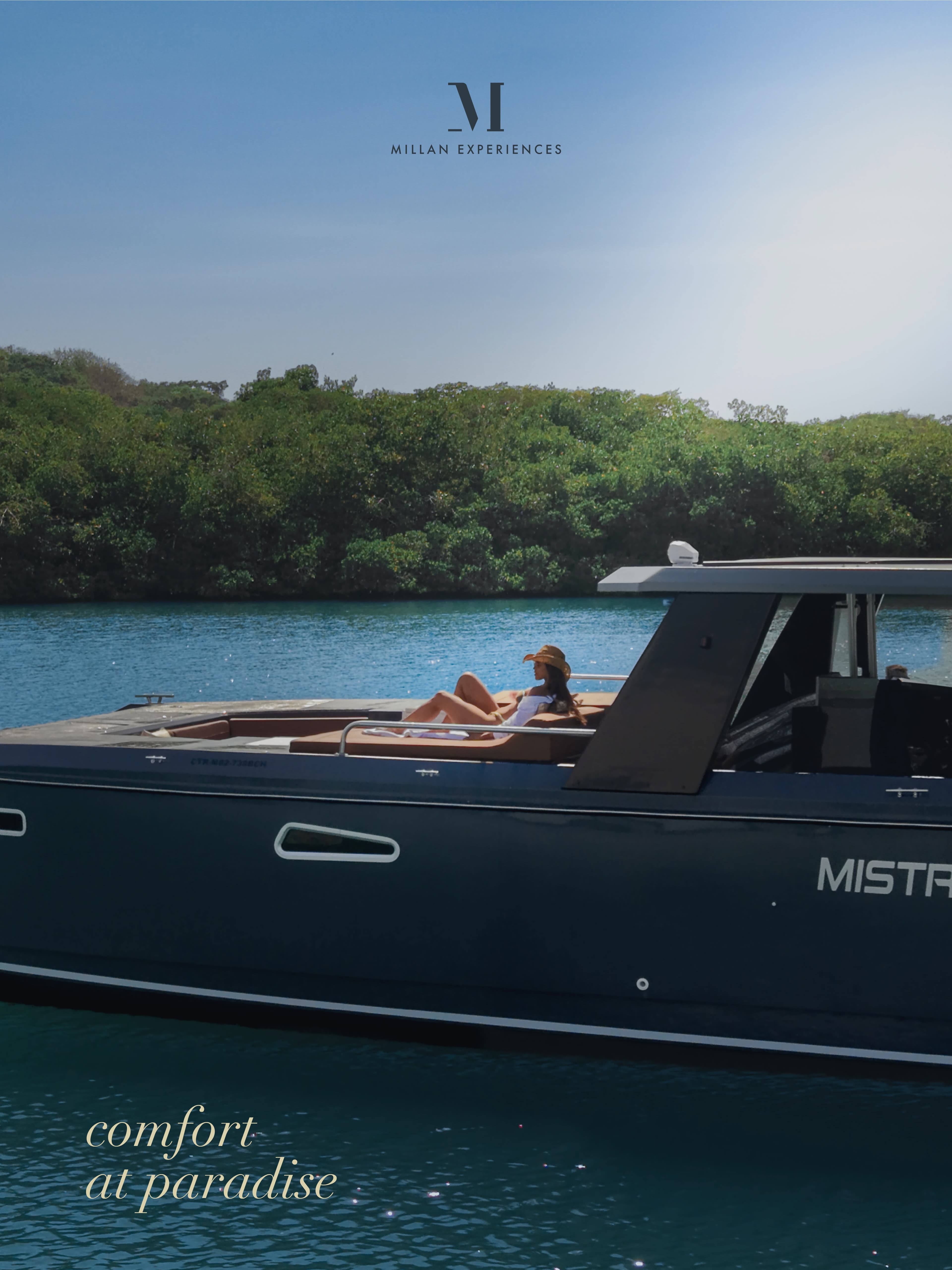 A guest relaxing on a Millan Experiences yacht by the mangroves.